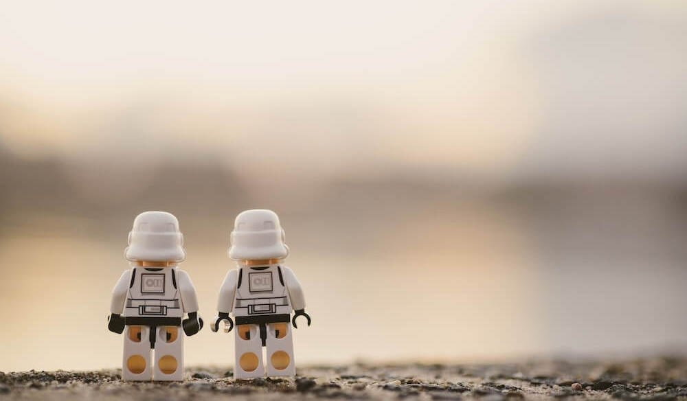 Two lego minifigs dressed as stormtroopers
